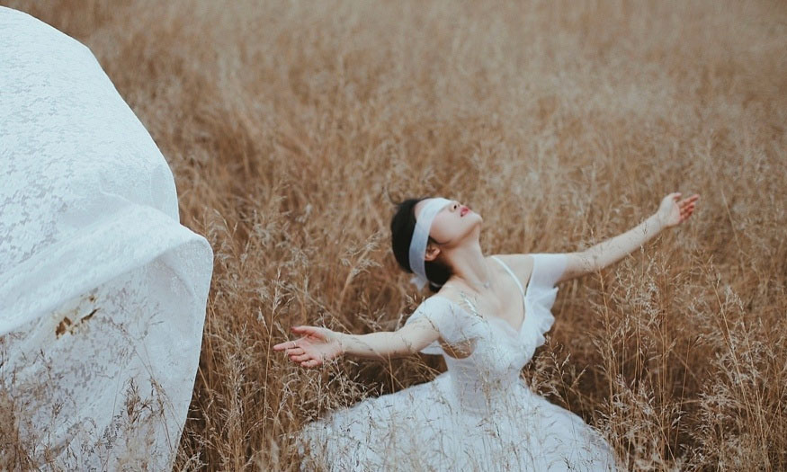Posing with arms outstretched